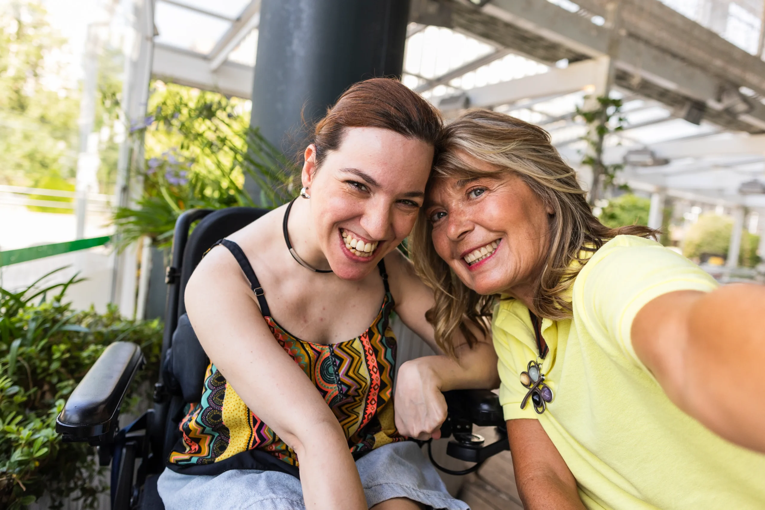 Smiling women posing together outdoors